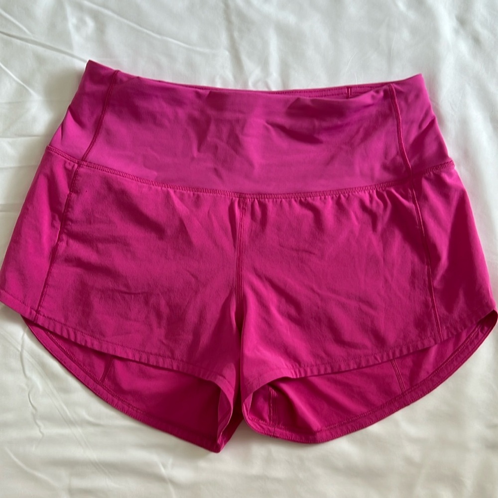 Lululemon women’s  high rise Speed Up short 2.5”, size 4. Hot pink